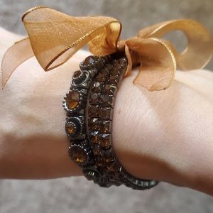 Women's brown stretchy bracelet with ribbon